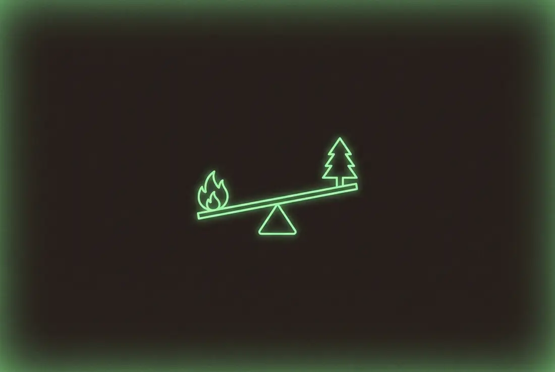 a glowing seesaw balancing a small flame on one side and an evergreen tree on the other