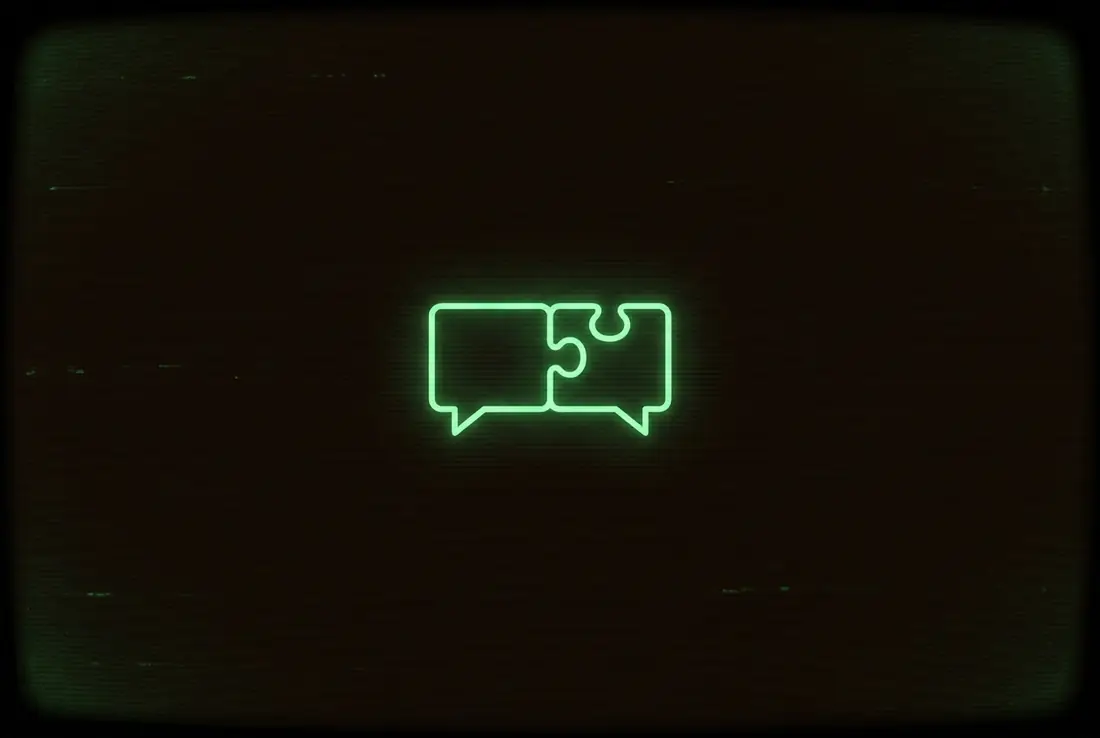 two glowing speech bubbles interlocking like puzzle pieces in the dark