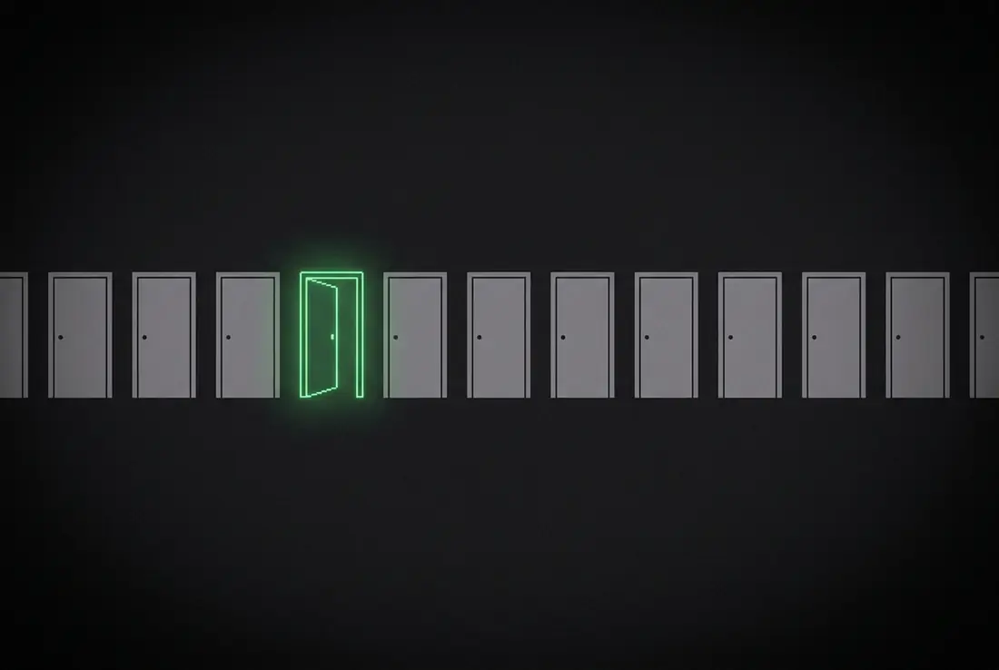 one glowing door standing open in a long row of identical closed grey doors