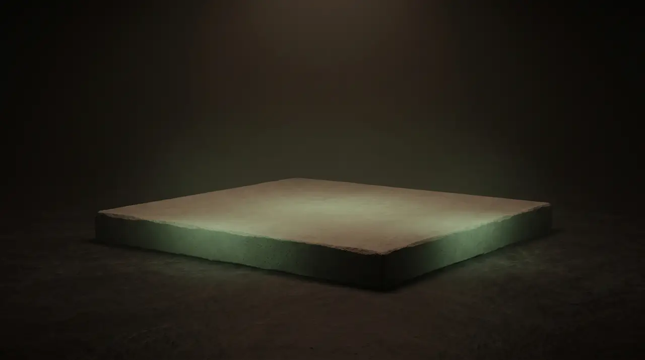 a modest green foundation slab with a faint price glow