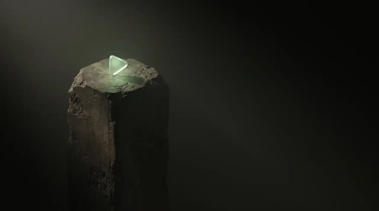 a small green play-button atop a tall dark competitive climb